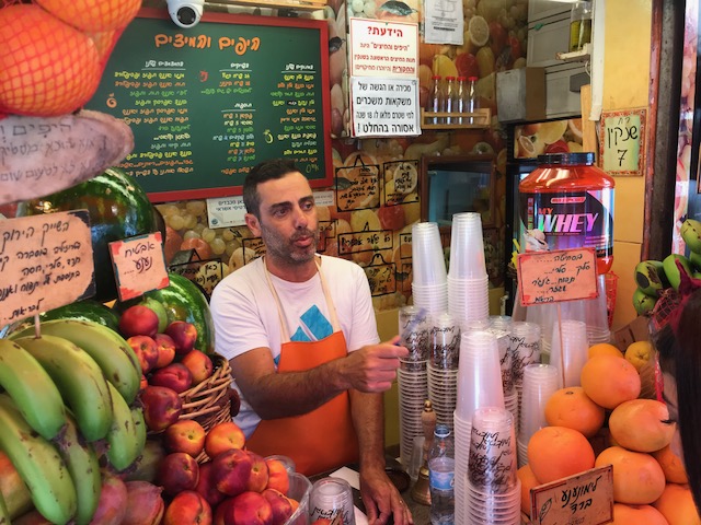 Ilan serving customers